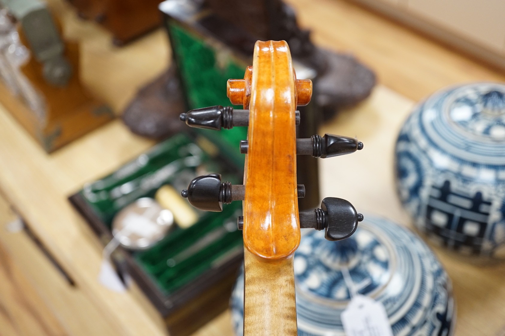 A cased violin, sound post loose